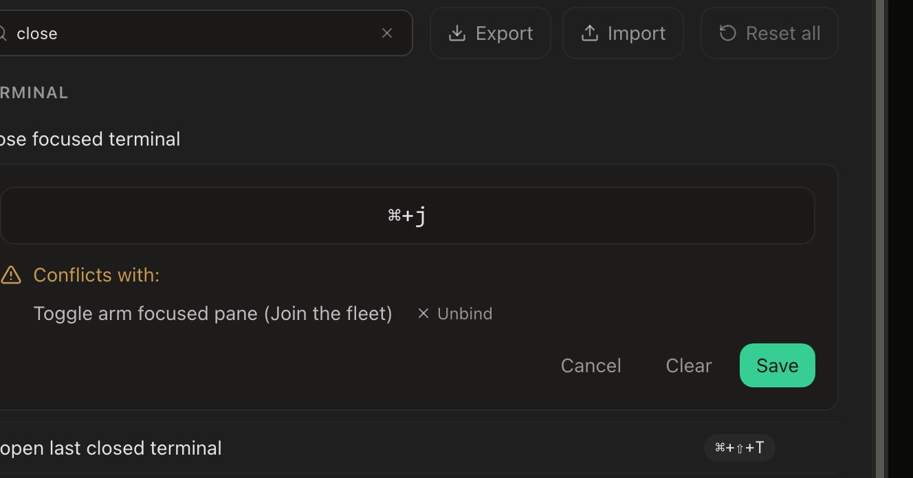The Keyboard tab filtered by a search for ‘close’, with Export, Import and Reset all above the list. The Close focused terminal row is open for editing: a chip holds the recorded combination Command+J, and beneath it an amber ‘Conflicts with:’ block names Toggle arm focused pane (Join the fleet) with an Unbind button, followed by Cancel, Clear and Save.